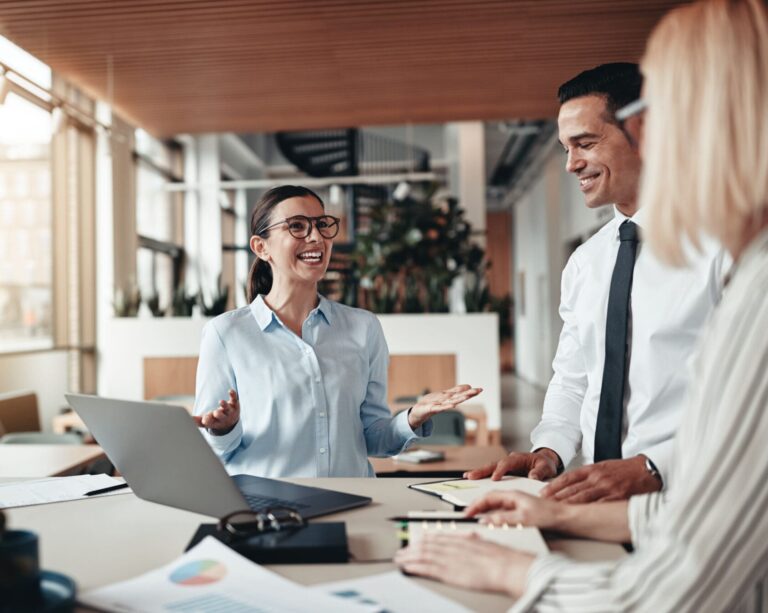 Executives and graduates in an office