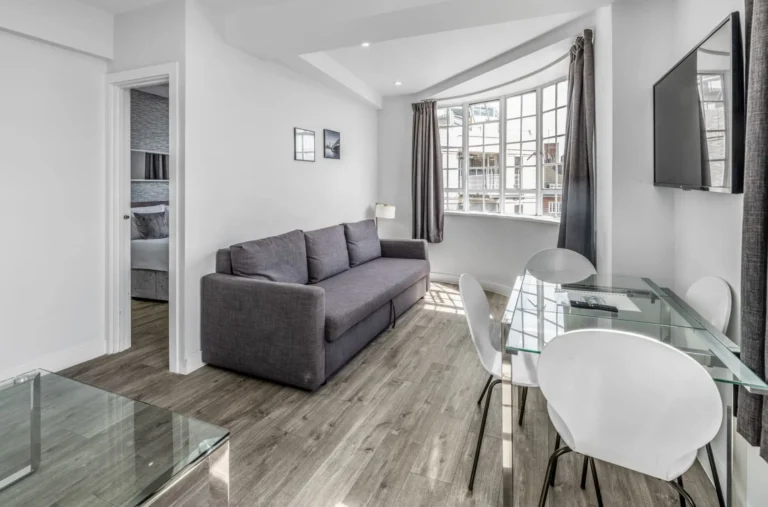 Fully furnished affordable serviced apartment living area for business travellers in London at Chelsea Cloisters